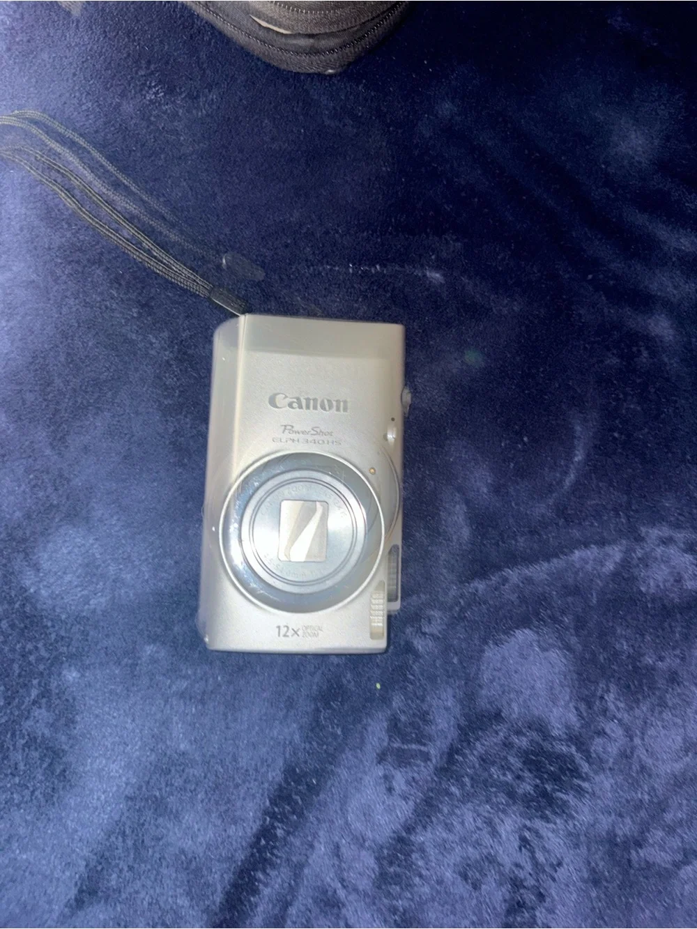 Canon Silver Point-and-Shoot Digital Camera with Black Carry Case